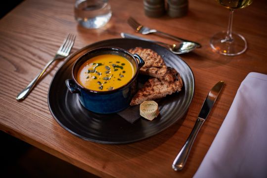 Soup of the moment, charred bread