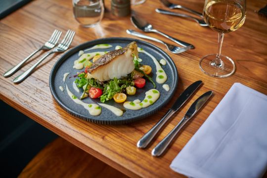 Grilled fillet of cod, Isle of Wight tomatoes, samphire & Ratte potato salad, lemon butter sauce